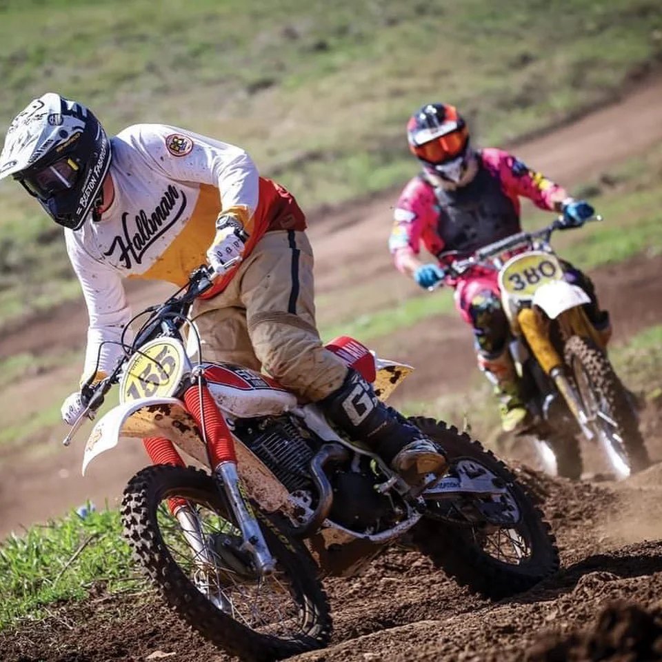Vintage motocross riders racing at a Heaven VMX event